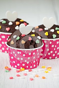 Chocolate cupcake on white wooden table