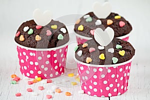 Chocolate cupcake on white wooden table