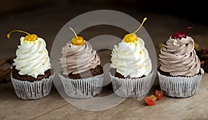 Chocolate Cupcakes with Cherry and Cream