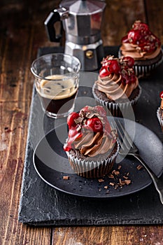 Chocolate cupcakes with dark chocolate ganashe frosting