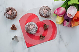 Chocolate Cupcakes decorated with sugar hearts for Valentines Day