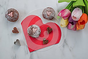 Chocolate Cupcakes decorated with sugar hearts for Valentines Day