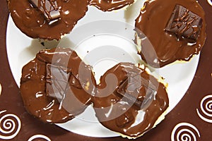 Chocolate cupcakes with piece of dark chocolate