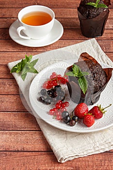 Chocolate cupcakes with summer berries.