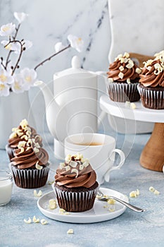 Chocolate cupcakes with sweet chocolate ganashe frosting