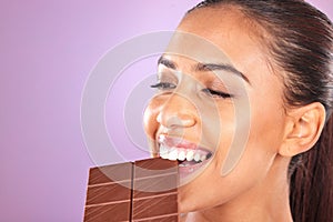 Chocolate, diet and woman, eating with beauty closeup and healthy candy, skin with luxury nutrition. Wellness, food and