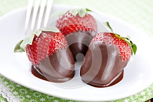 Chocolate dipped strawberries photo