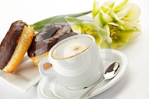 Chocolate donuts with coffee