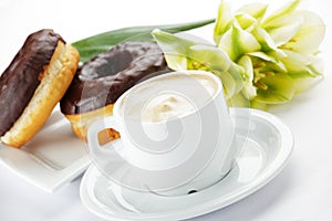 Chocolate donuts with coffee