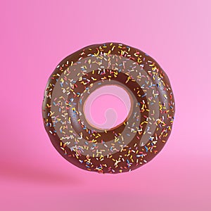 Chocolate doughnut on pink background