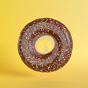 Chocolate doughnut on yellow background