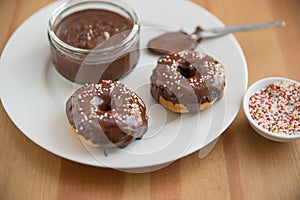 Chocolate Doughnuts with sprinkles