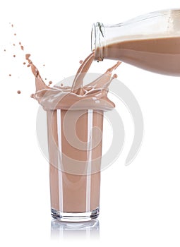 Chocolate drink milk pouring pour splash splashing glass bottle isolated on white