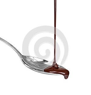 Chocolate dripping from a spoon