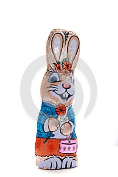Chocolate Easter bunny on an isolated white background, female figure, Easter candy, specially for children, egg hunt