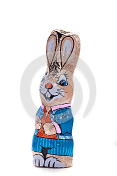 Chocolate Easter bunny on an isolated white background, male figure, Easter candy, specially for children, egg hunt