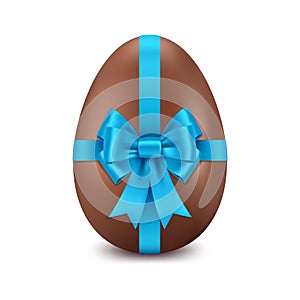 Chocolate Easter egg with blue bow, on a white background, design element for Happy Easter