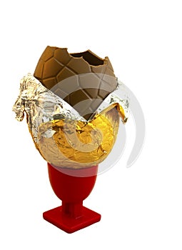 A Chocolate Easter Egg Sitting in an Eggcup photo