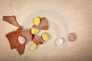 Chocolate Easter eggs on plain background with space for easter message