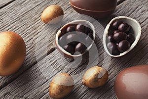 Chocolate easter eggs on wooden background
