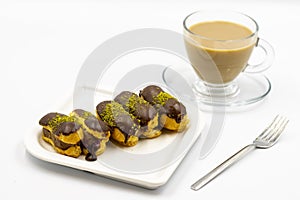 Chocolate eclair cake isolated on white background. Close up