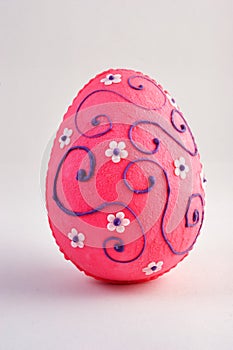 Chocolate egg decorated with sugar flowers