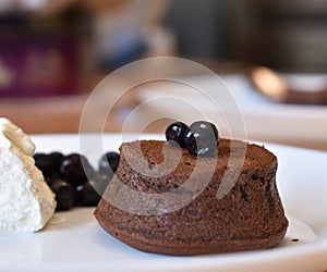 Chocolate fondant with ice cream and blueberries