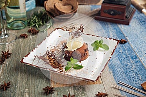 Chocolate fondant with ice cream mint and garnish