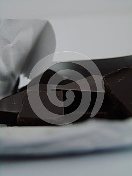 Chocolate - a food made from roasted ground cacao beans photo