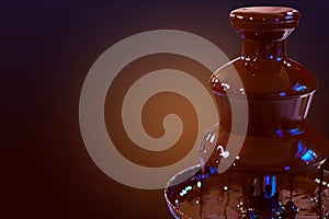 Chocolate fountain fondue. Chocolate fountain on a dark gradient background