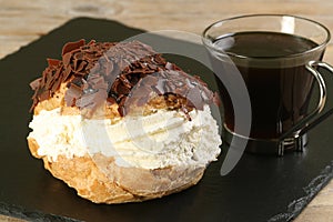 Chocolate and fresh cream choux bun photo