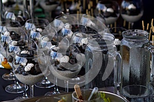 Chocolate, fruit and marshmallow, fashionably served in glasses, party dinner