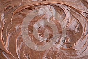 Chocolate fudge frosting close view