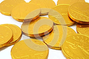 Chocolate gold coins, randomly scattered