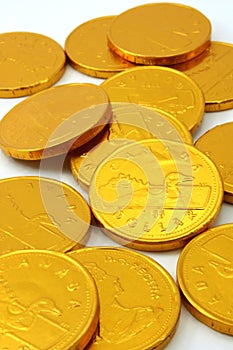 Chocolate gold coins, scattered