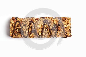 Chocolate granola bar isolated on white background. Healthy sweet dessert snack. Cereal granola bar with nuts, chocolate and