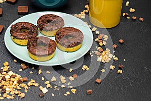 Chocolate granola muesli with chocolate milk,almonds, hazelnuts and doughnuts