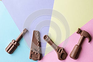 Chocolate hand tools on a colourful background