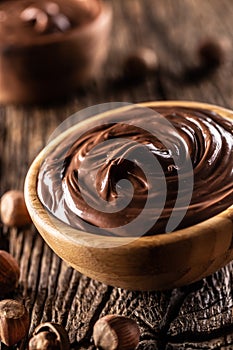 Chocolate hazelnut spread in wooden bowl - Close up