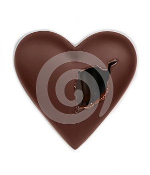 Chocolate heart pierced with a hole