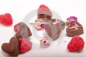 Chocolate hearts, roses and rasberries