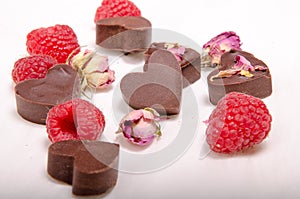 Chocolate hearts, roses and rasberries