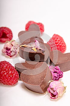 Chocolate hearts, roses and rasberries