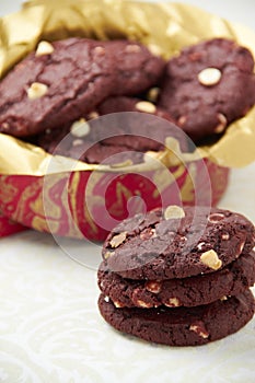 Chocolate Holiday Cookies stacked with a Basket