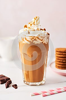 Chocolate ice coffee with whipped cream and cookies