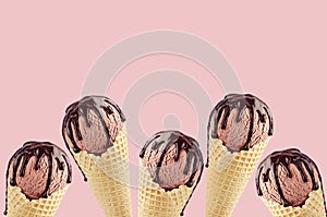 Chocolate ice cream in crisp waffle cones with sweet brown sauce as border on pink background, mock up.