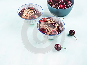 Chocolate ice cream sundae with cherries