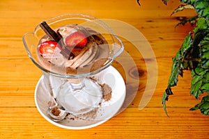 Chocolate ice cream in a sundae dish, top view