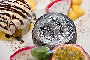 Chocolate lava cake with ice cream and fruit