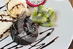 chocolate lava cake set served with ice cream vanila,wiped and m